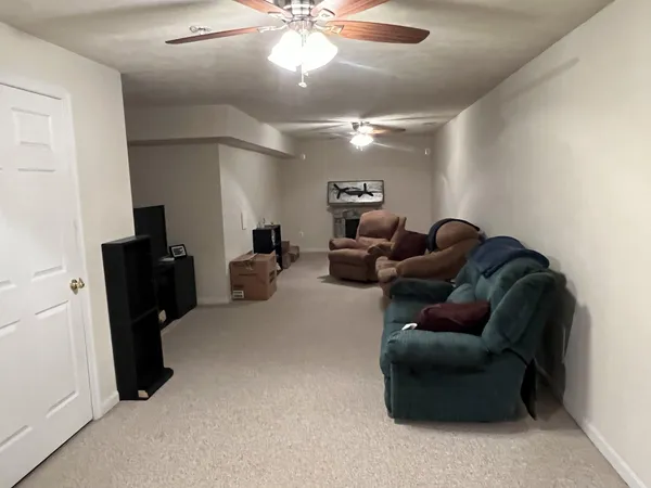 a bathroom with a toilet and shower