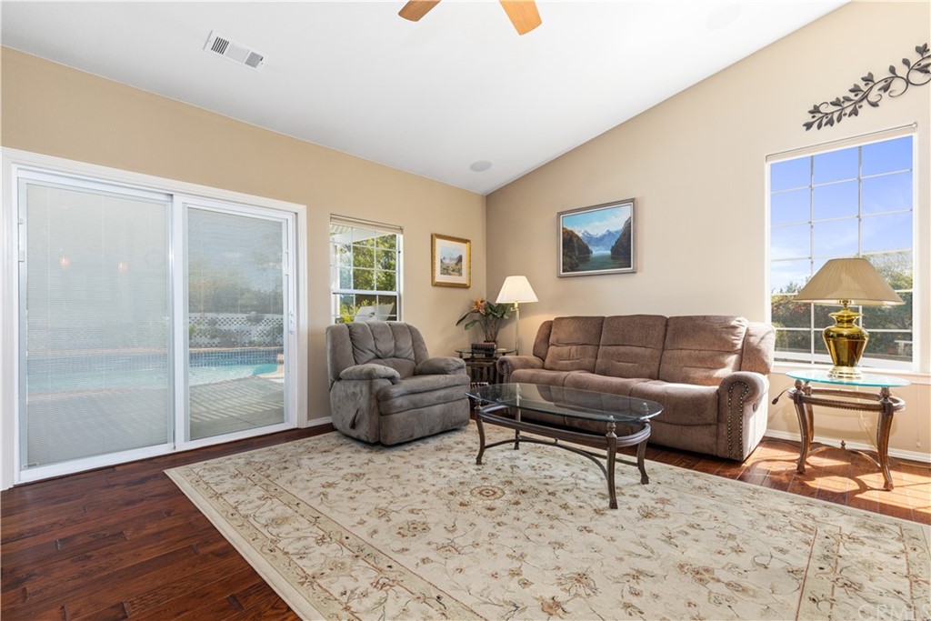 1612 Via Flora Paso Robles, CA 93446 - Photo 15 of 35 a living room with furniture and a wooden floor