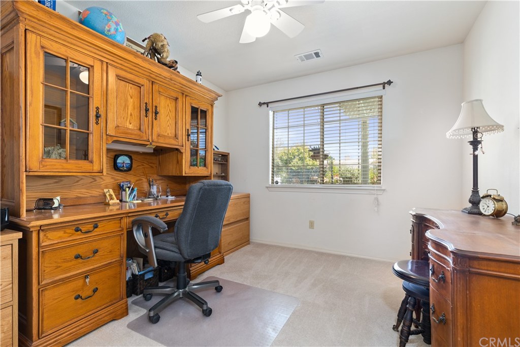1612 Via Flora Paso Robles, CA 93446 - Photo 17 of 35 a view of a workspace with furniture and a window
