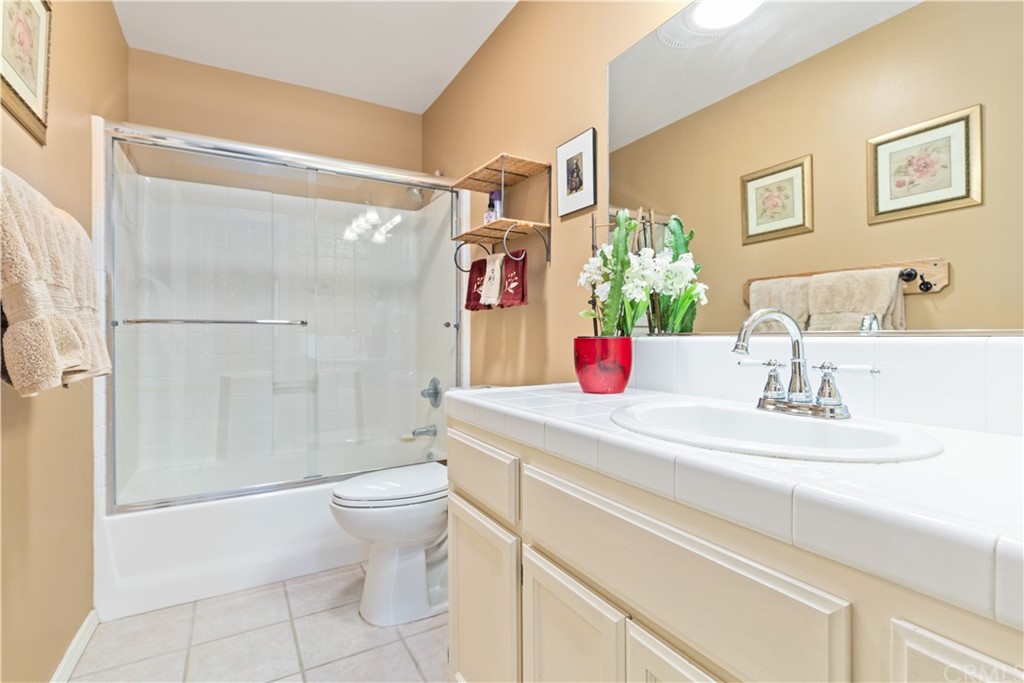 1612 Via Flora Paso Robles, CA 93446 - Photo 21 of 35 a bathroom with a sink toilet and shower