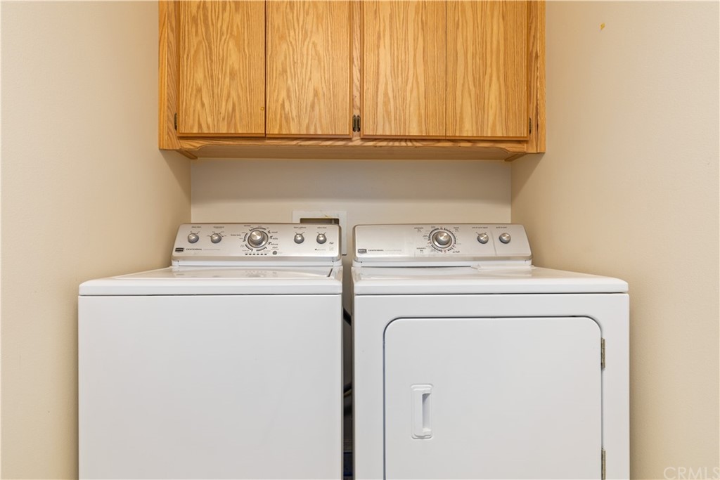 1612 Via Flora Paso Robles, CA 93446 - Photo 22 of 35 a utility room with dryer and washer