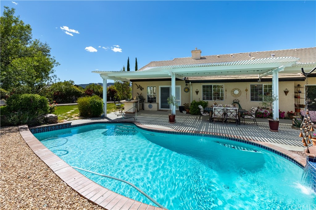 1612 Via Flora Paso Robles, CA 93446 - Photo 24 of 35 a view of a swimming pool with patio