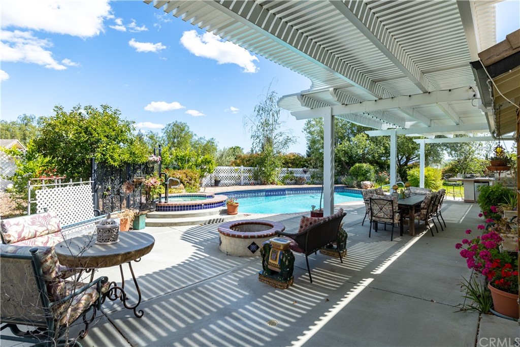 1612 Via Flora Paso Robles, CA 93446 - Photo 28 of 35 a outdoor space with lots of tables a garden and chairs