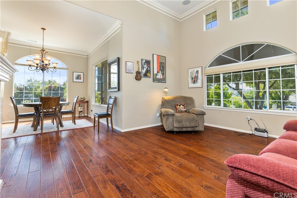 1612 Via Flora Paso Robles, CA 93446 - Photo 9 of 35 a living room with furniture and a large window