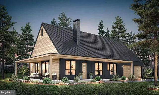 a front view of house and yard with green space