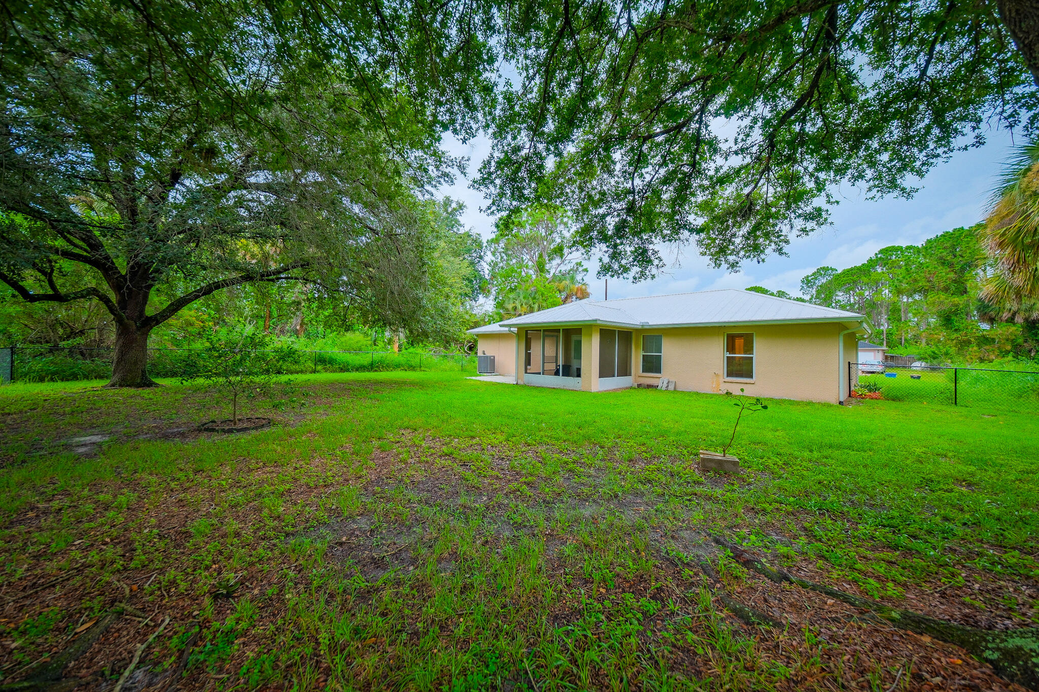 762 Gerlitz Road Southwest Palm Bay, FL 32908 - Photo 28 of 29 a front view of a house with garden