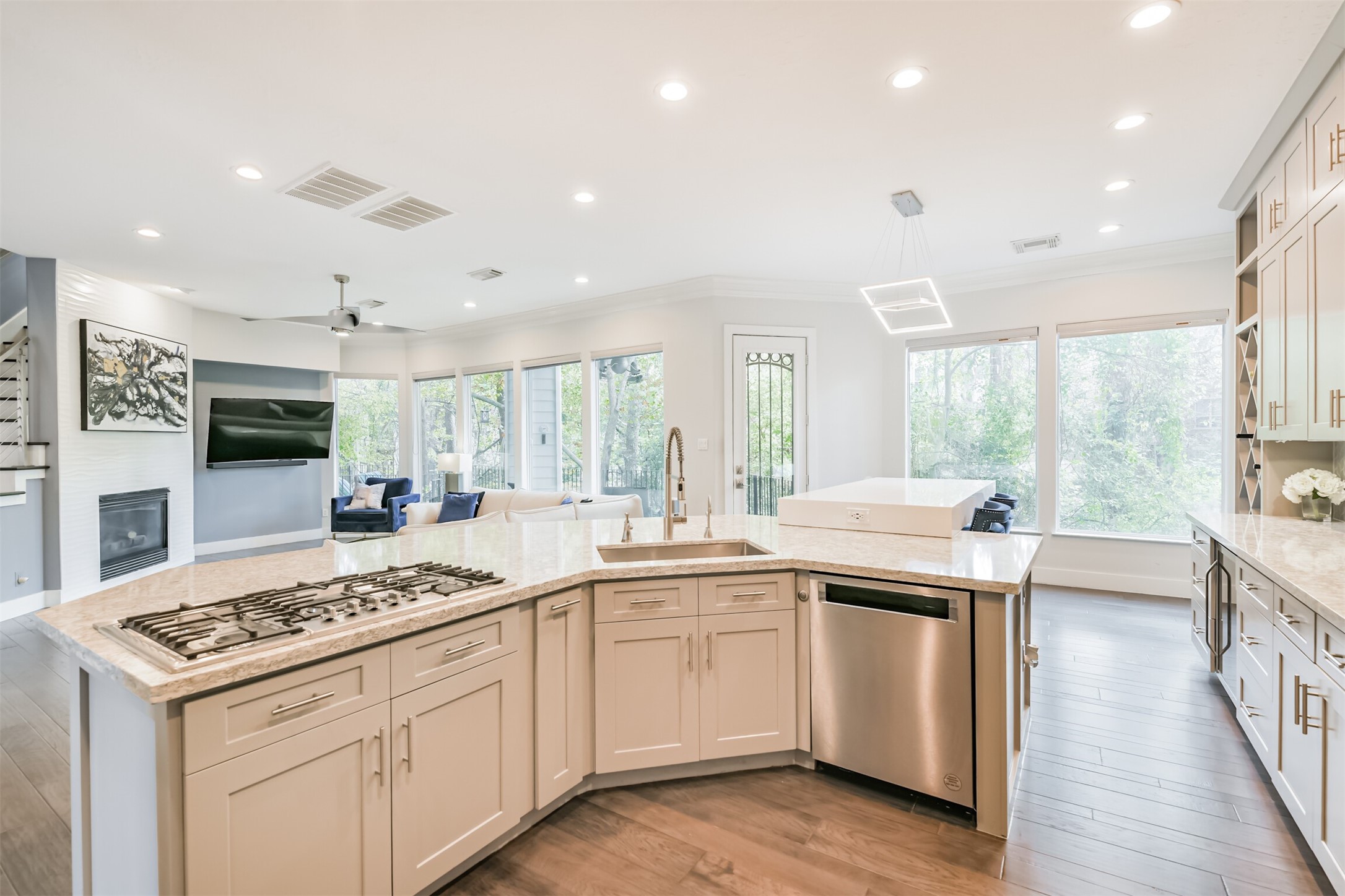 12636 Briar Patch Drive Houston, TX 77077 - Photo 13 of 43 The island holds the gas cooktop, SS dishwasher and deep basin sink.