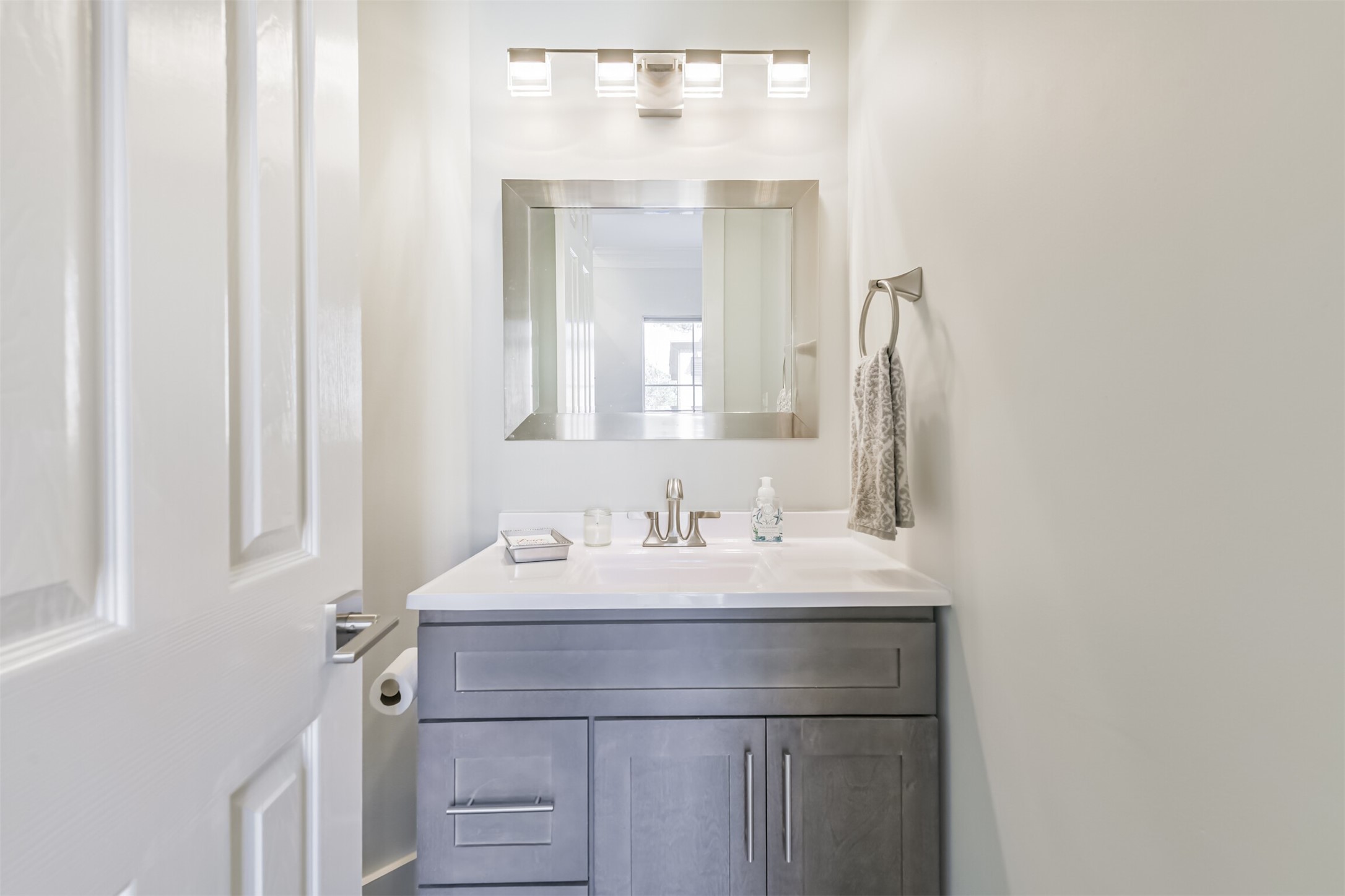 12636 Briar Patch Drive Houston, TX 77077 - Photo 21 of 43 The half bathroom has an updated vanity and framed mirror.