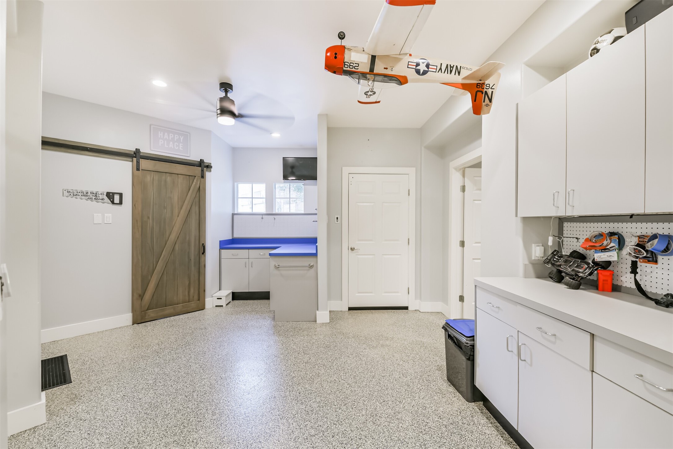 12636 Briar Patch Drive Houston, TX 77077 - Photo 36 of 43 This space is in the garage with extra storage cabinets and counters.