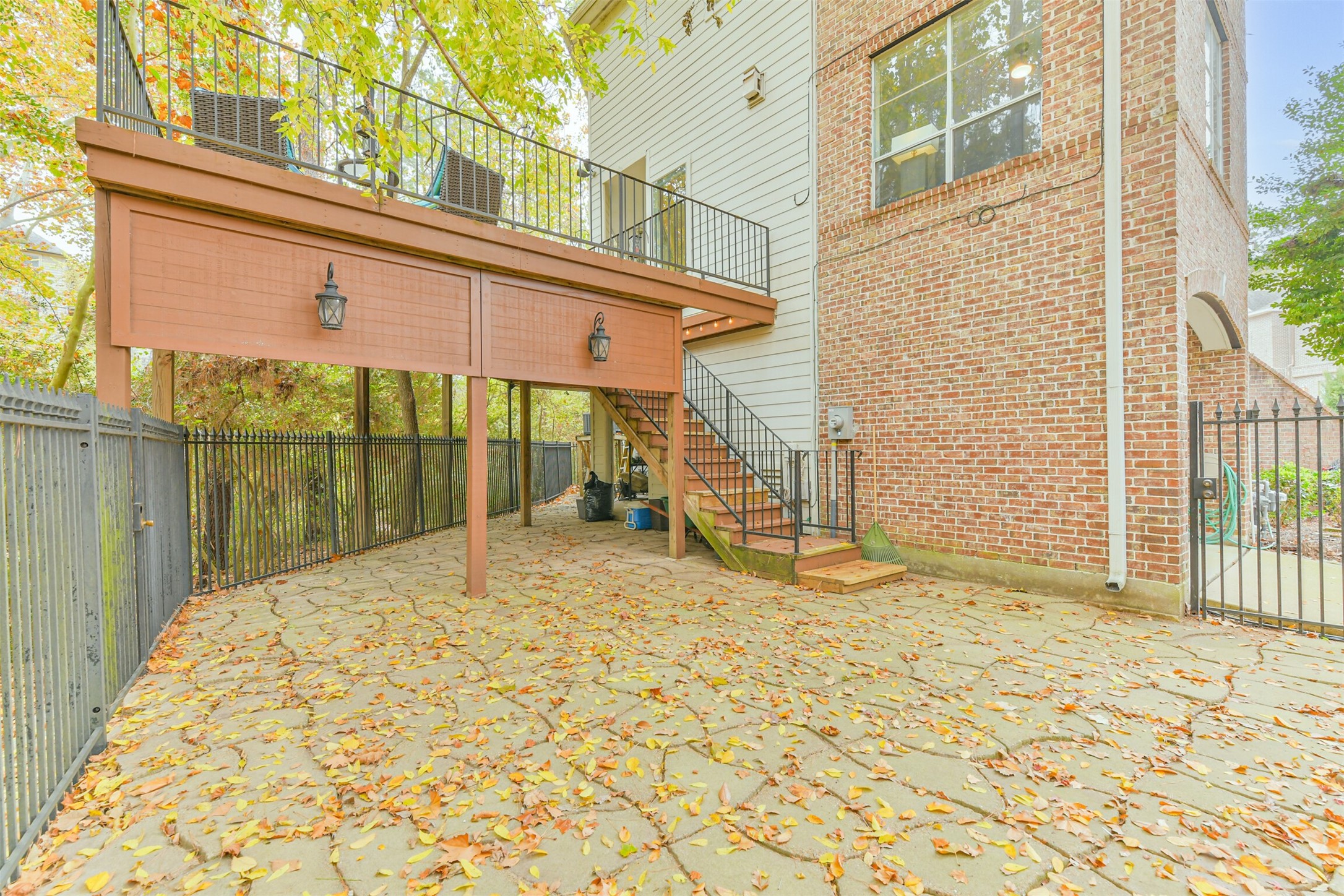 12636 Briar Patch Drive Houston, TX 77077 - Photo 39 of 43 There is a spacious patio area on the ground level.