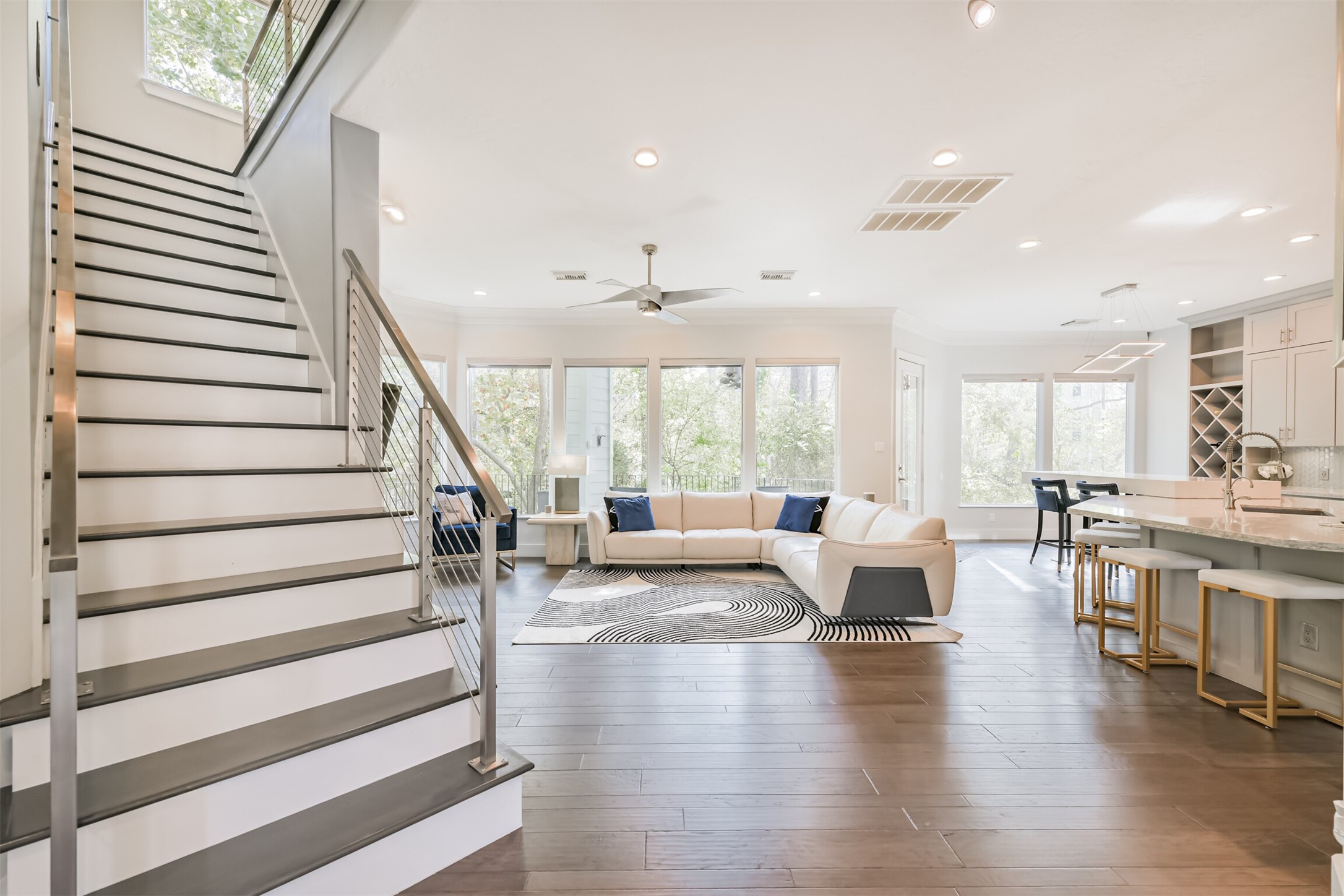 12636 Briar Patch Drive Houston, TX 77077 - Photo 4 of 43 When you walk inside from the front entry, you are entering into the second floor that features Engineered hardwood floors that flow throughout the living spaces.
