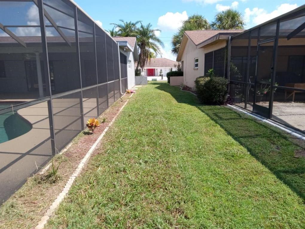 738 Flamingo Drive Apollo Beach, FL 33572 - Photo 14 of 15 a view of a backyard