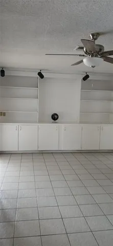 a view of lot of floor and window