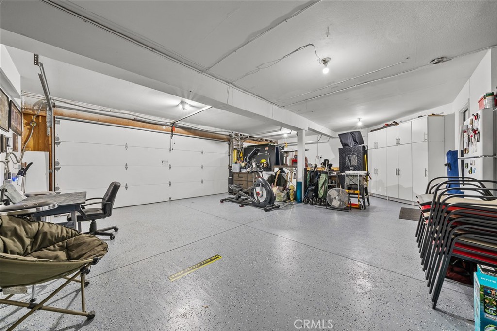 27687 Ron Ridge Drive Saugus, CA 91350 - Photo 17 of 50 a view of a room with gym equipment