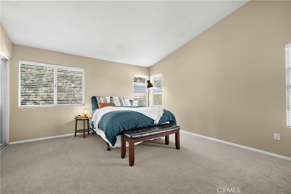 27687 Ron Ridge Drive Saugus, CA 91350 - Photo 18 of 50 a bedroom with a bed and a window