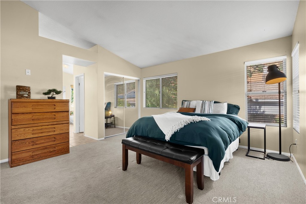 27687 Ron Ridge Drive Saugus, CA 91350 - Photo 19 of 50 a spacious bedroom with a bed and dresser