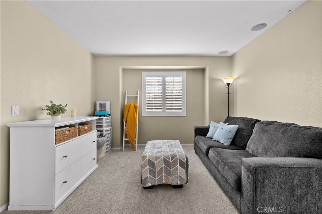 27687 Ron Ridge Drive Saugus, CA 91350 - Photo 27 of 50 a living room with furniture and a window
