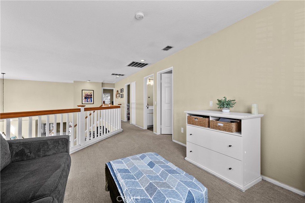 27687 Ron Ridge Drive Saugus, CA 91350 - Photo 28 of 50 a living room with furniture and a window