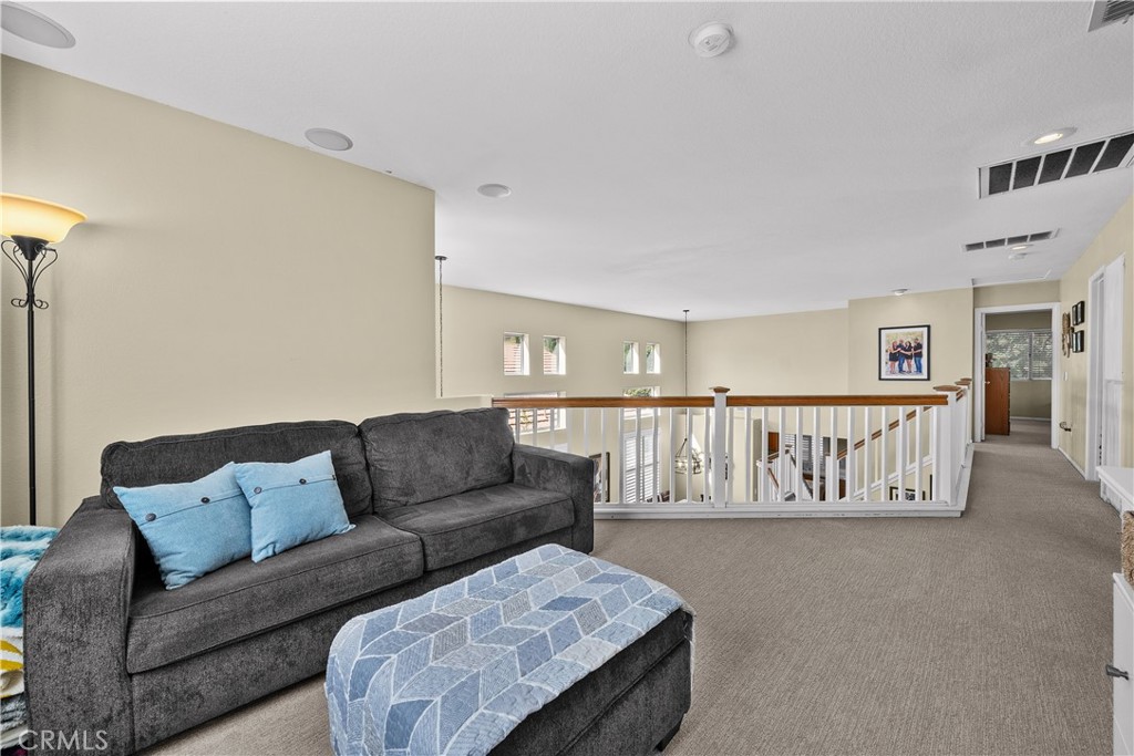 27687 Ron Ridge Drive Saugus, CA 91350 - Photo 29 of 50 a living room with furniture and a rug