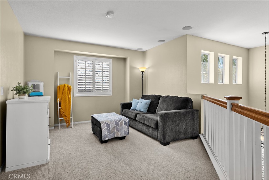 27687 Ron Ridge Drive Saugus, CA 91350 - Photo 30 of 50 a living room with furniture and a window
