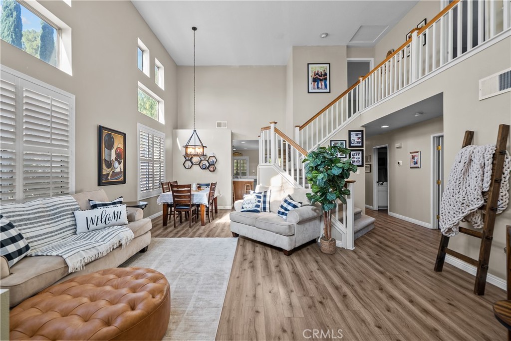 27687 Ron Ridge Drive Saugus, CA 91350 - Photo 3 of 50 a living room with furniture and wooden floor