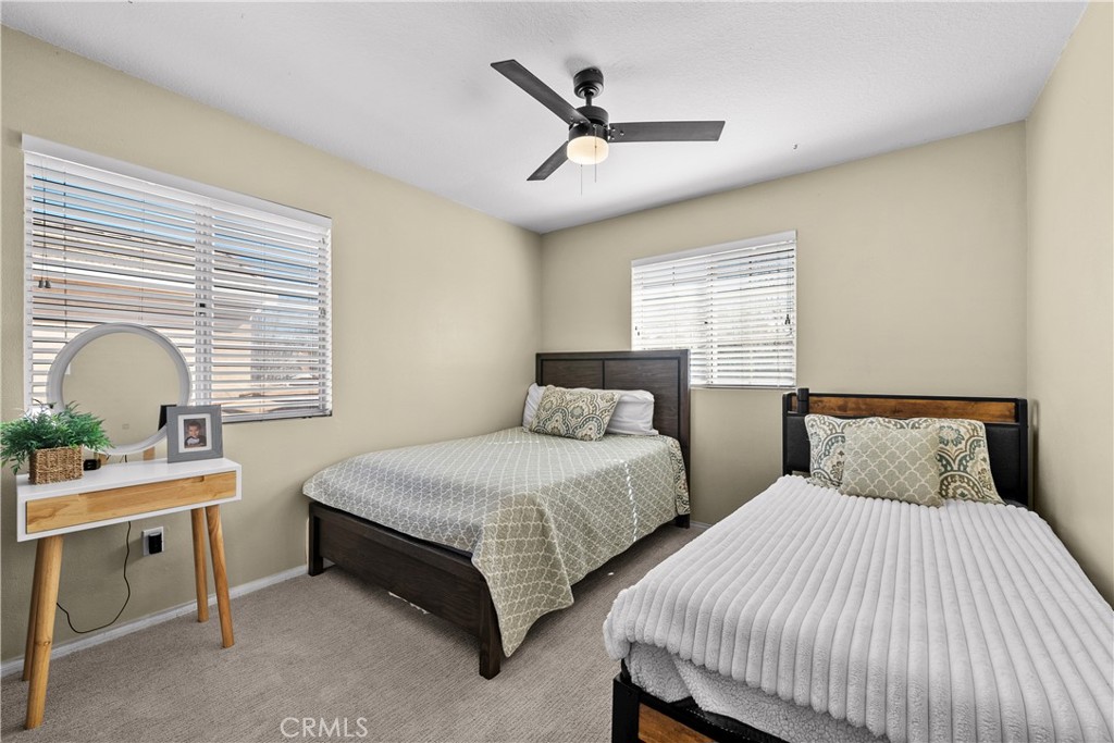 27687 Ron Ridge Drive Saugus, CA 91350 - Photo 31 of 50 a bedroom with two beds and a table
