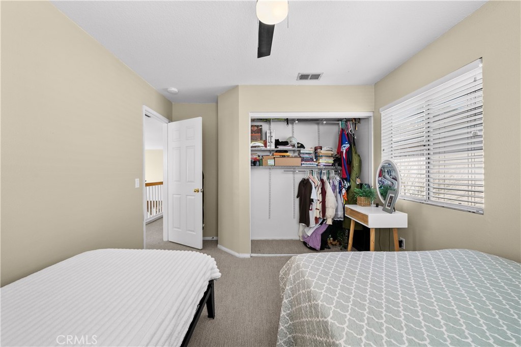 27687 Ron Ridge Drive Saugus, CA 91350 - Photo 32 of 50 a bedroom with a bed and a dresser