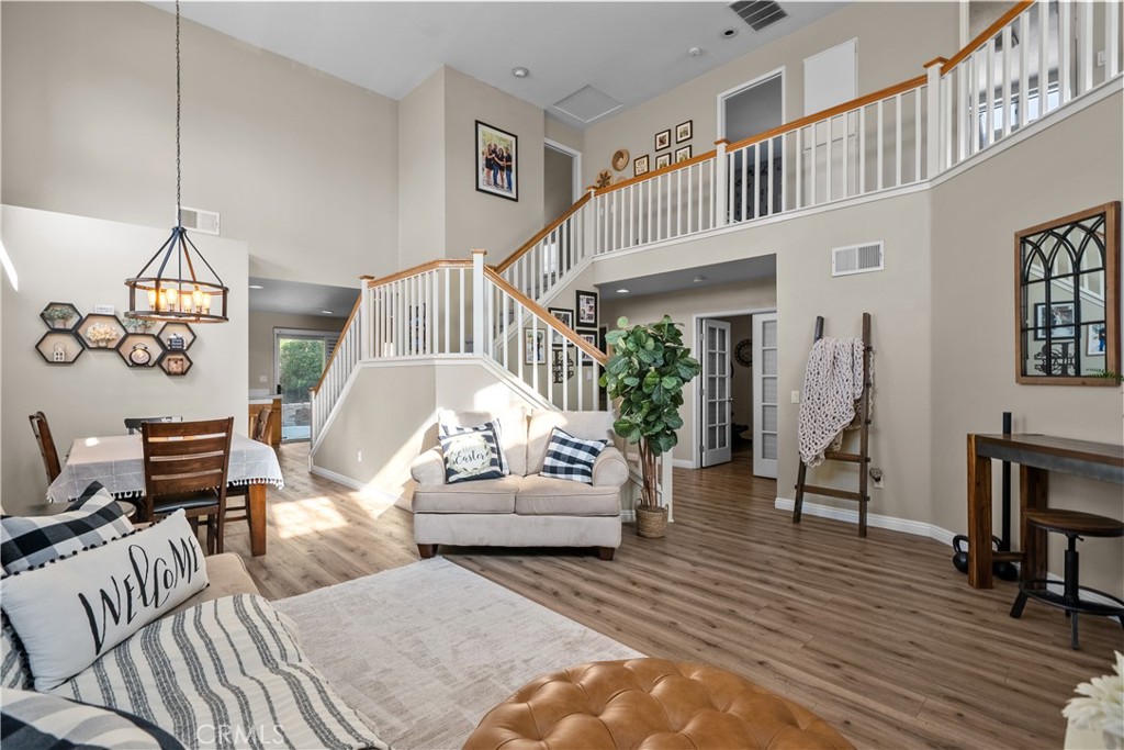 27687 Ron Ridge Drive Saugus, CA 91350 - Photo 4 of 50 a living room with furniture and wooden floor