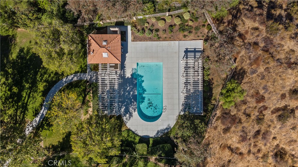 27687 Ron Ridge Drive Saugus, CA 91350 - Photo 46 of 50 front view of a house with a yard and plants