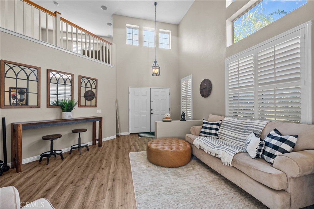 27687 Ron Ridge Drive Saugus, CA 91350 - Photo 5 of 50 a living room with furniture and wooden floor