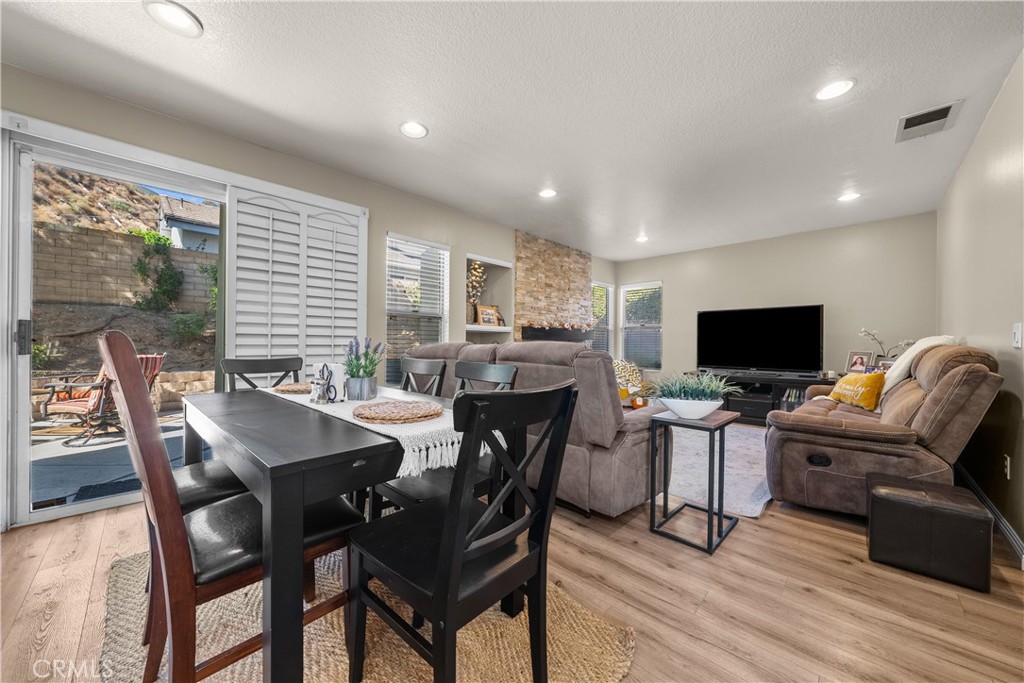 27687 Ron Ridge Drive Saugus, CA 91350 - Photo 10 of 50 a view of a dining room with furniture window and outside view