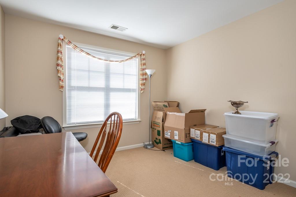 17341 Villanova Road Huntersville, NC 28078 - Photo 15 of 17 a bedroom with furniture and a window