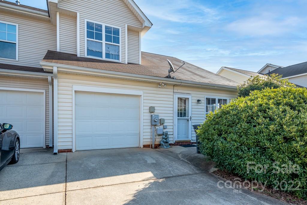17341 Villanova Road Huntersville, NC 28078 - Photo 2 of 17 a front view of a house with garage