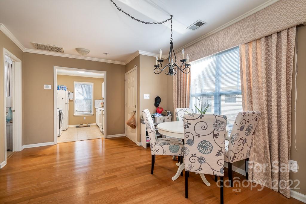 17341 Villanova Road Huntersville, NC 28078 - Photo 6 of 17 a living room with furniture and a large window