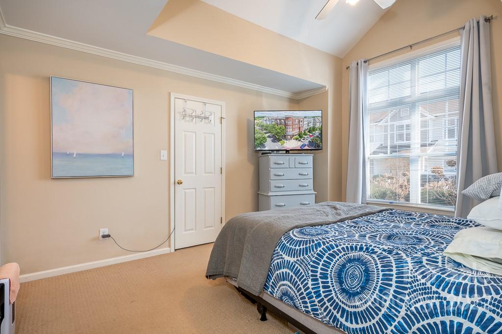 17341 Villanova Road Huntersville, NC 28078 - Photo 10 of 17 a bedroom with a bed and wooden floor