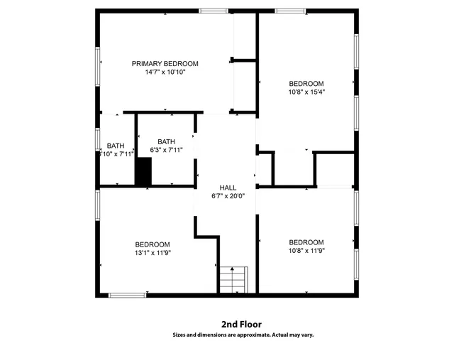 a black and white photo of a wall with white walls