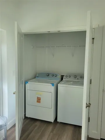 a utility room with dryer and washer