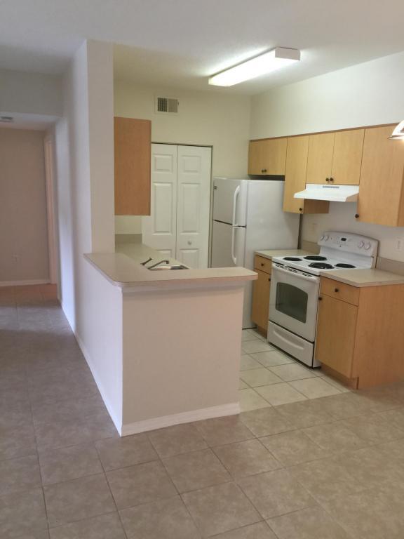 10318 Fox Trail Road South, Unit 404 Royal Palm Beach, FL 33411 - Photo 2 of 11 kitchen 2 spa 404