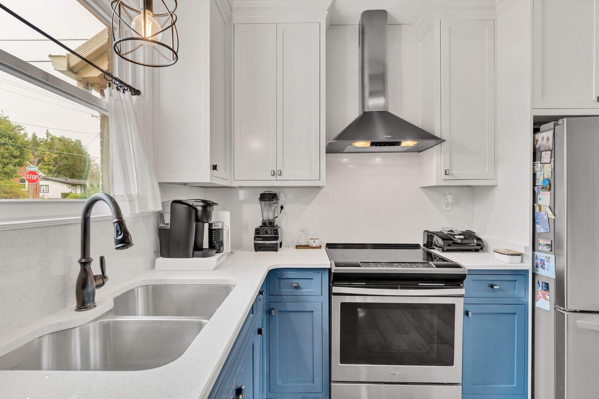 305 Connell Street Springfield, TN 37172 - Photo 13 of 46 a kitchen with stainless steel appliances granite countertop a sink stove and cabinets
