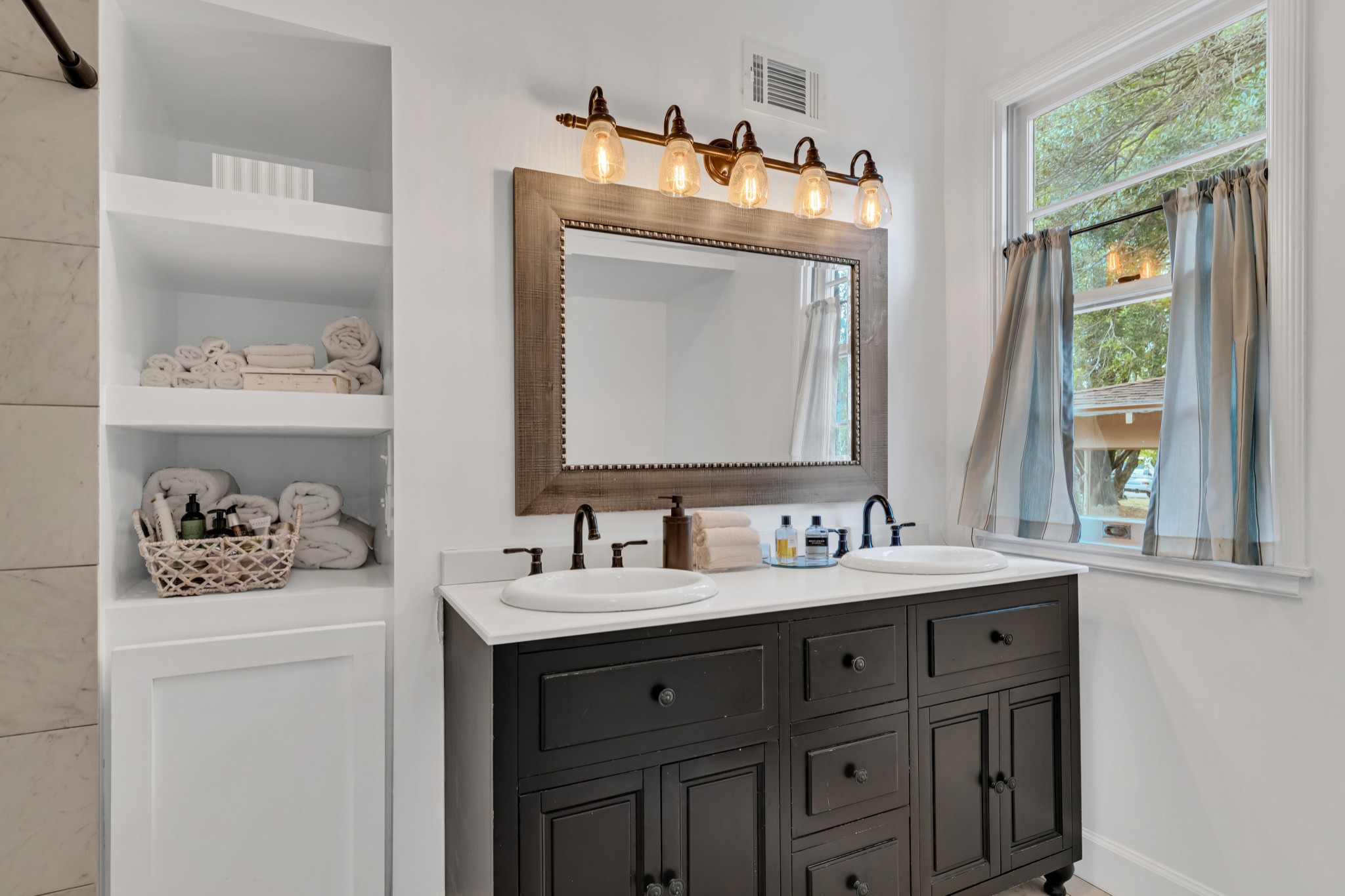 305 Connell Street Springfield, TN 37172 - Photo 18 of 46 a bathroom with a sink vanity and a mirror