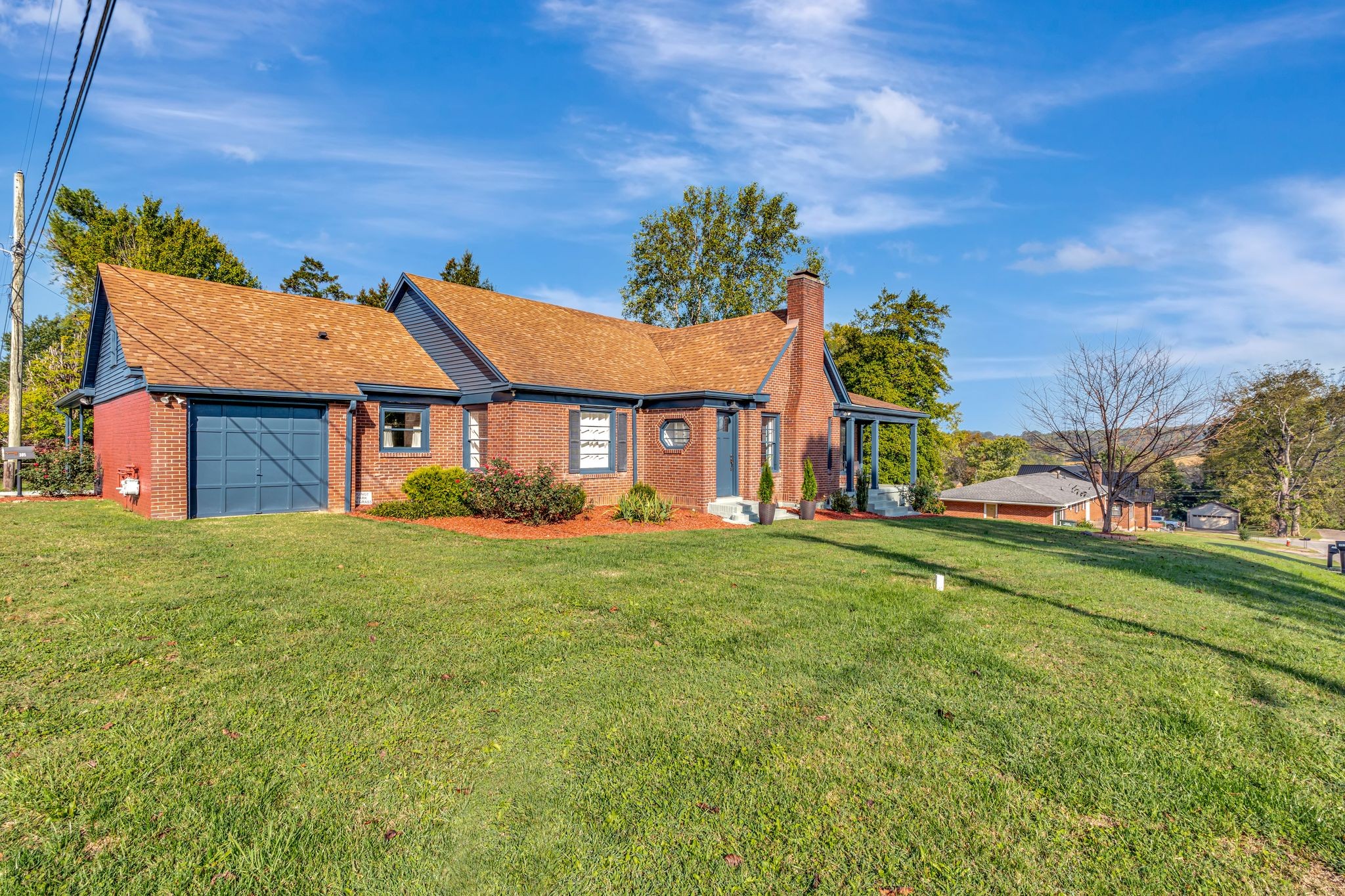 305 Connell Street Springfield, TN 37172 - Photo 2 of 46 a front view of a house with a garden