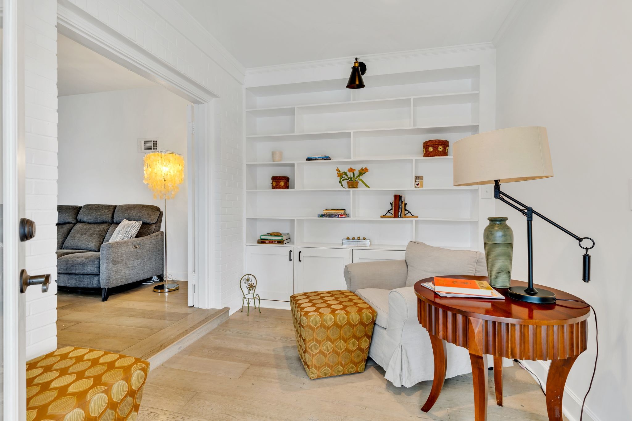 305 Connell Street Springfield, TN 37172 - Photo 23 of 46 a bedroom with a bed and a chandelier