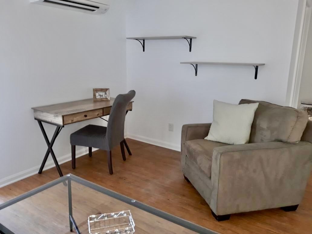 305 Connell Street Springfield, TN 37172 - Photo 35 of 46 a living room with furniture and a wooden floor