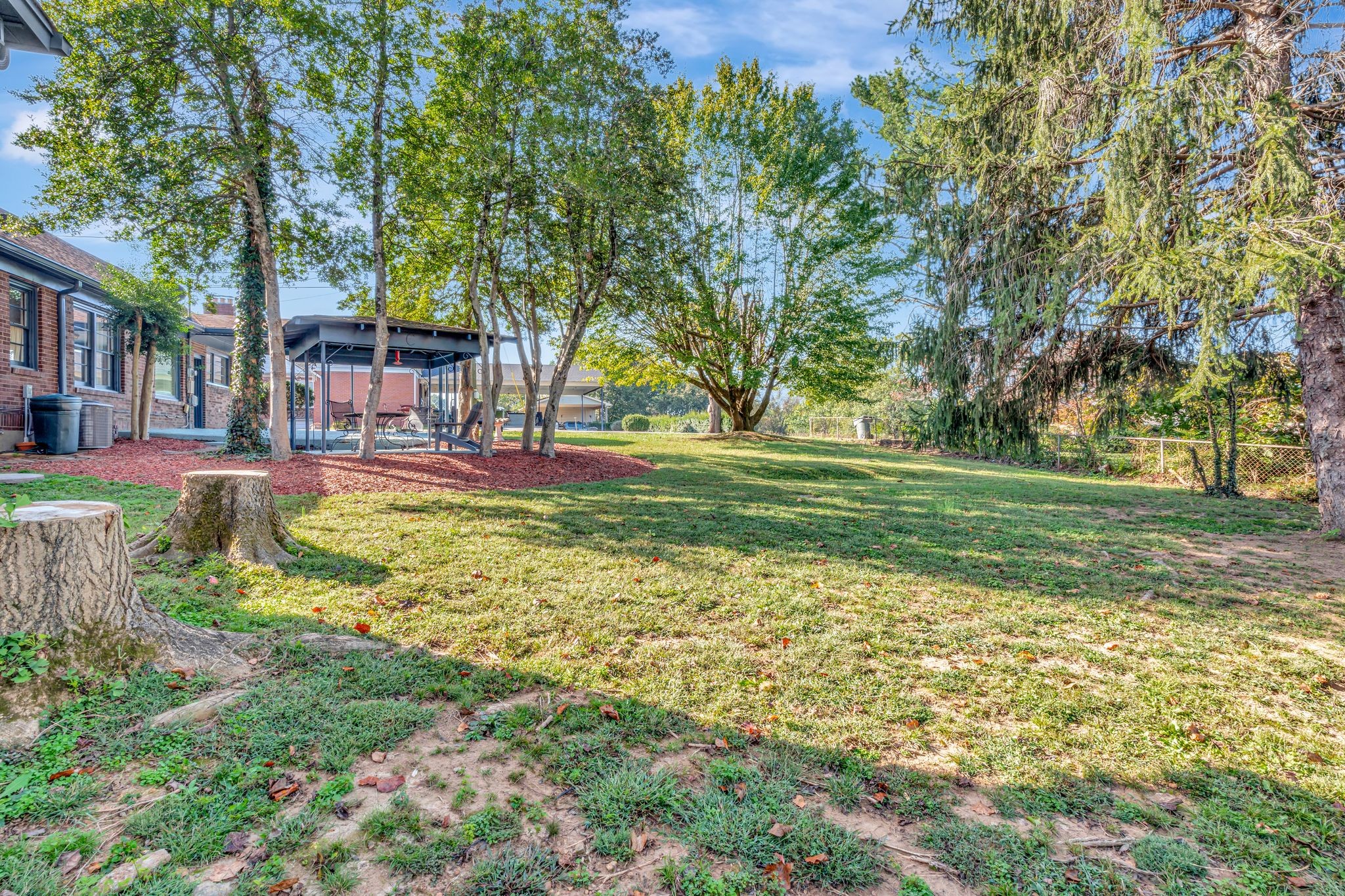 305 Connell Street Springfield, TN 37172 - Photo 44 of 46 a view of a yard with plants and trees