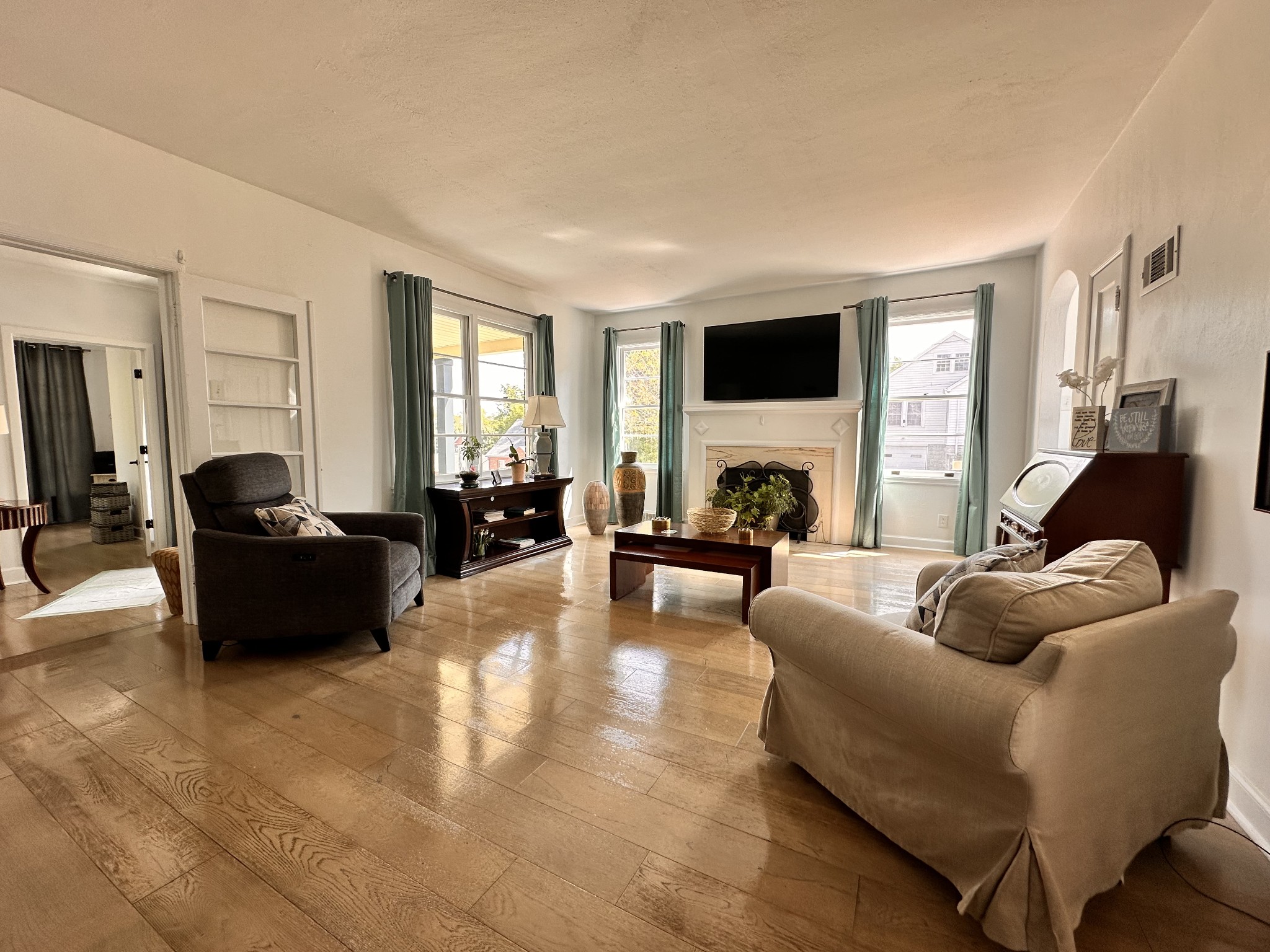 305 Connell Street Springfield, TN 37172 - Photo 5 of 46 a living room with furniture and a flat screen tv