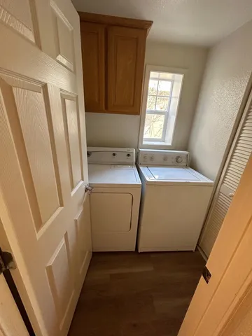 a utility room with dryer and washer