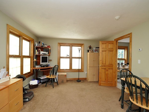 22 Hudson Road Stow, MA 01775 - Photo 11 of 28 a view of a workspace with furniture and a window