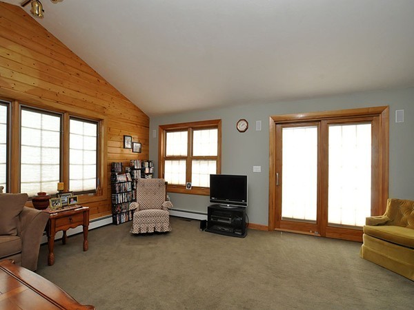 22 Hudson Road Stow, MA 01775 - Photo 9 of 28 a living room with furniture and large windows