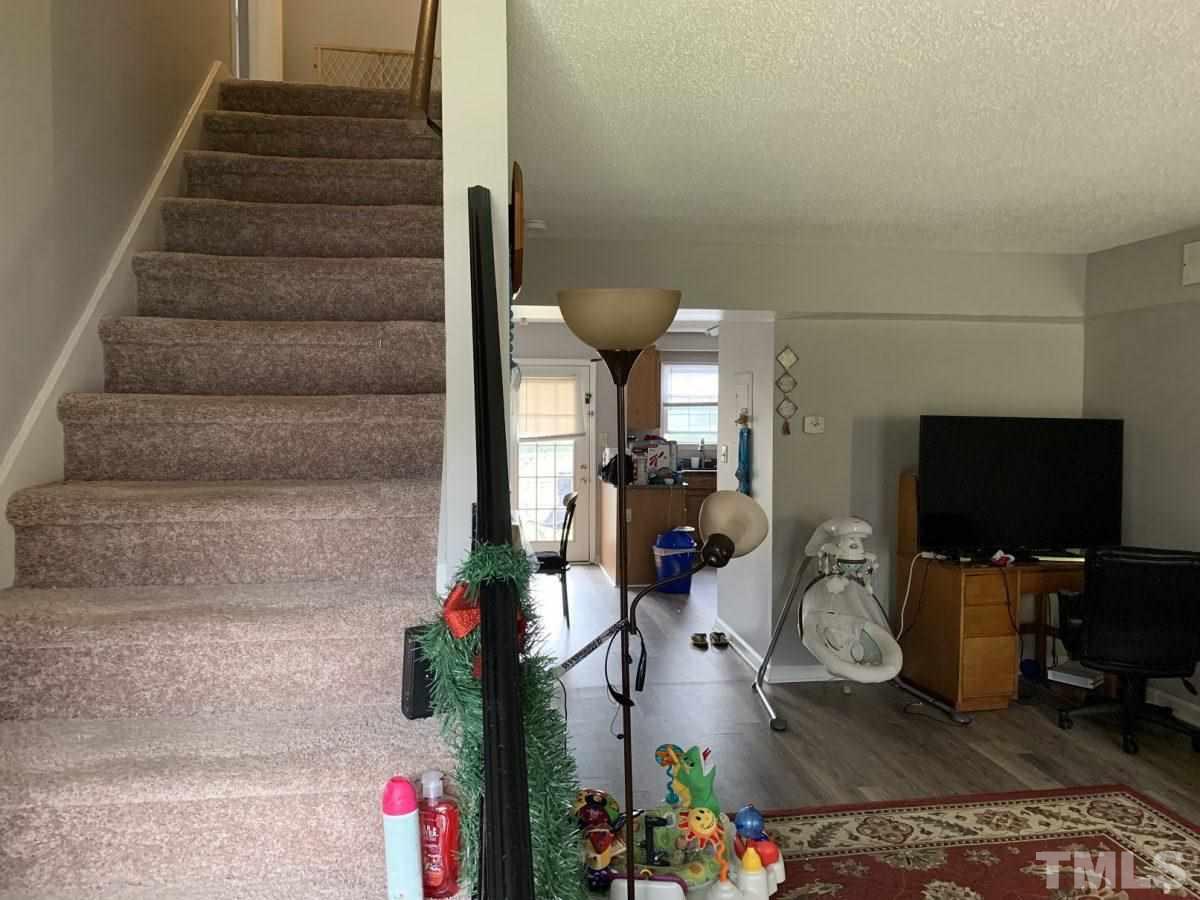 145 Jones Franklin Road, Unit D Raleigh, NC 27606 - Photo 2 of 14 a view of entryway and hall
