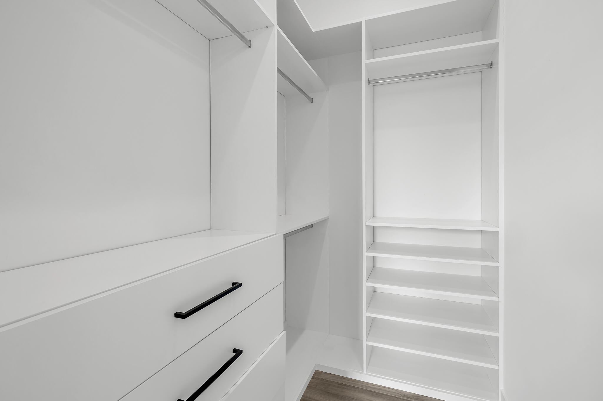 3711 Northeast 30th Avenue Lighthouse Point, FL 33064 - Photo 52 of 57 a view of walk in closet with empty racks